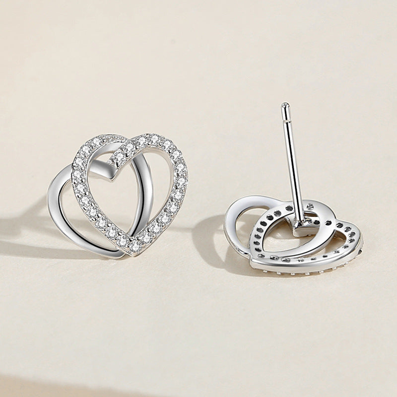 Hanan Double-Heart Zircon Stud Earrings – 925 Sterling Silver