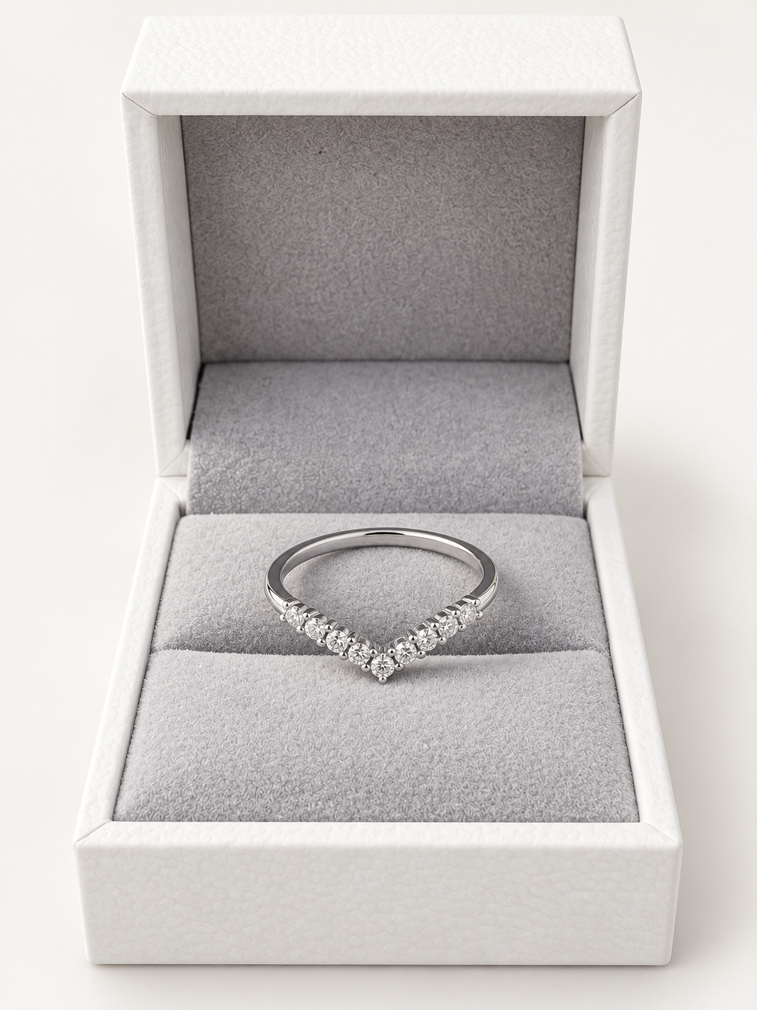 Dina rhodium-plated moissanite ring worn on the hand