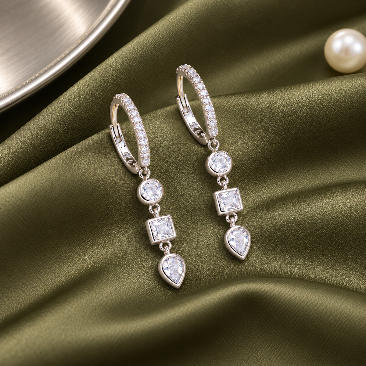 Amaya three-stone drop huggie earrings, view 3: pavé huggie hoops with a three-stone clear CZ drop, Dubai