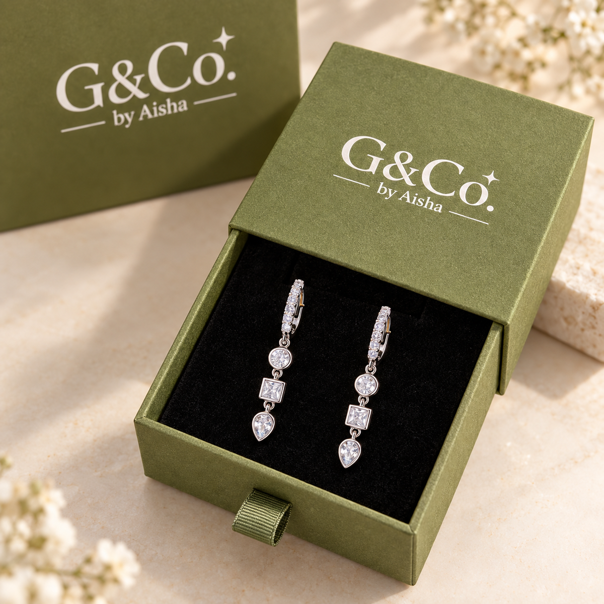 Amaya three-stone drop huggie earrings, view 4: pavé huggie hoops with a three-stone clear CZ drop, Dubai