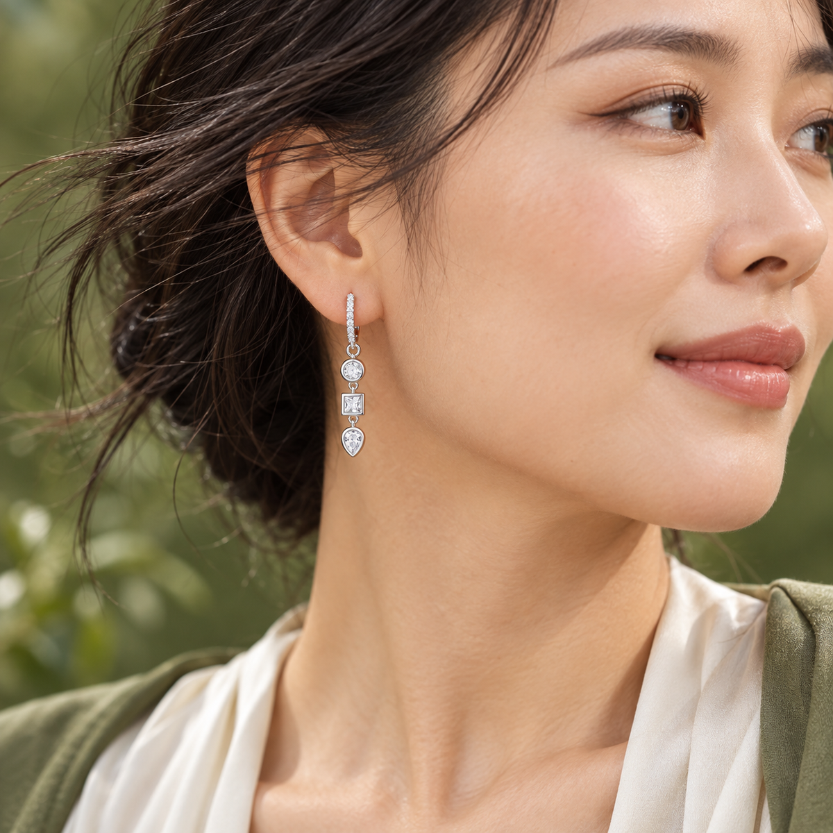 Amaya three-stone drop huggie earrings, view 5: pavé huggie hoops with a three-stone clear CZ drop, 925 sterling silver, Dubai