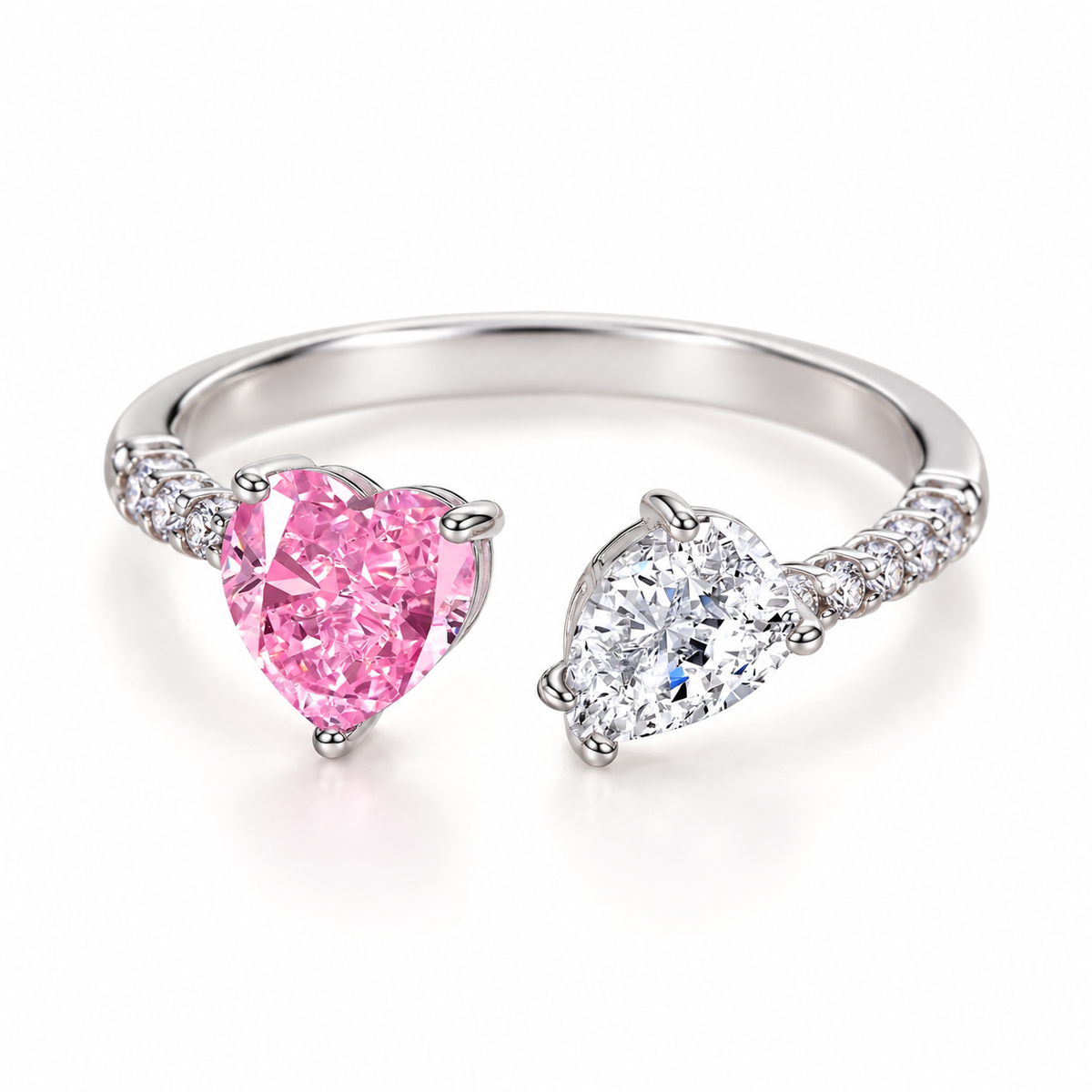 Amora two hearts pink & clear CZ adjustable ring close-up: pink heart-cut CZ beside a smaller clear heart, Dubai