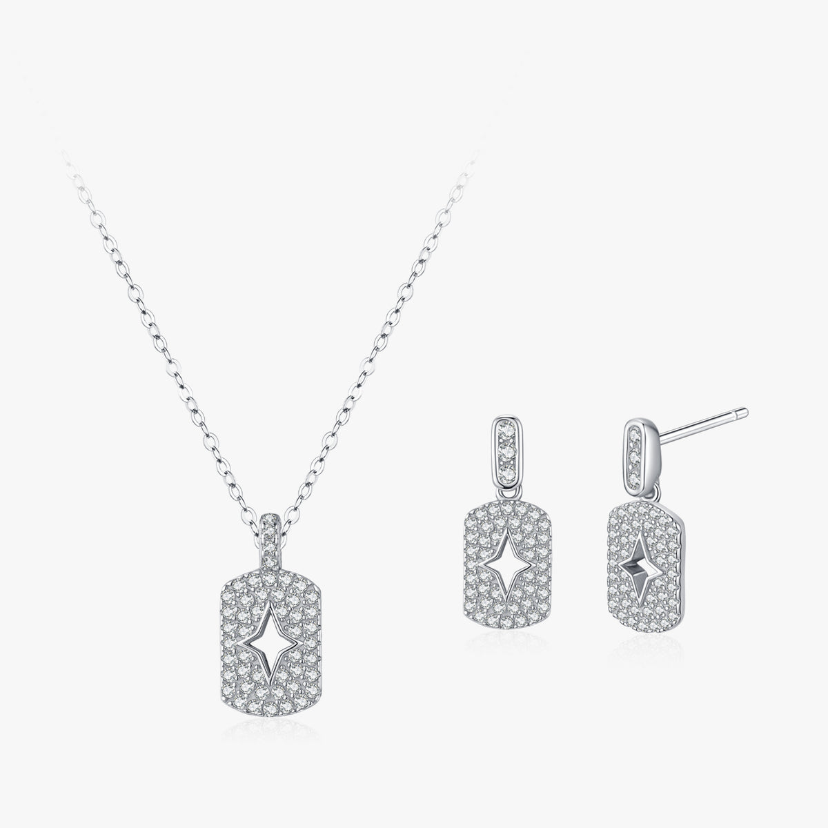 Astra star-cutout necklace & drop earrings set close-up: star-cutout pendant and matching drops framed in pavé, Dubai