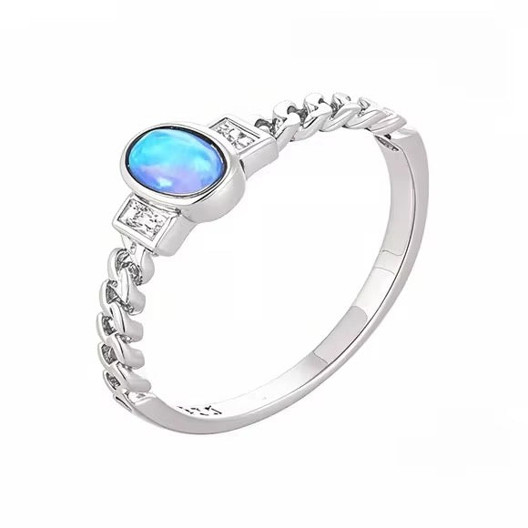 Aurevia moissanite & opal ring close-up: moissanite and opal stones on a rhodium-plated band, 925 sterling silver, Dubai
