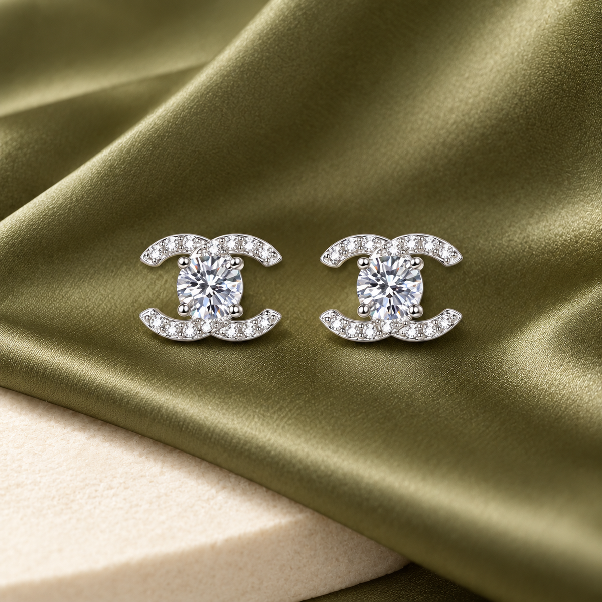 Celeste double-C moissanite stud earrings, view 2: 5 mm round moissanite studs framed by double-C curves, Dubai