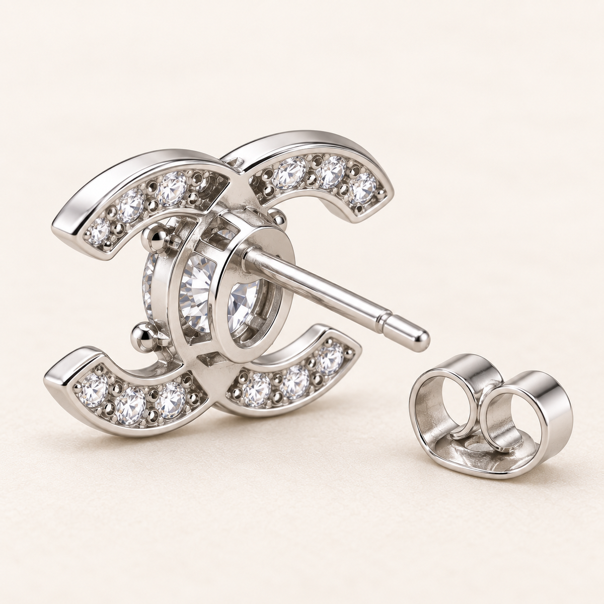 Celeste double-C moissanite stud earrings, view 6: 5 mm round moissanite studs framed by double-C curves, Dubai