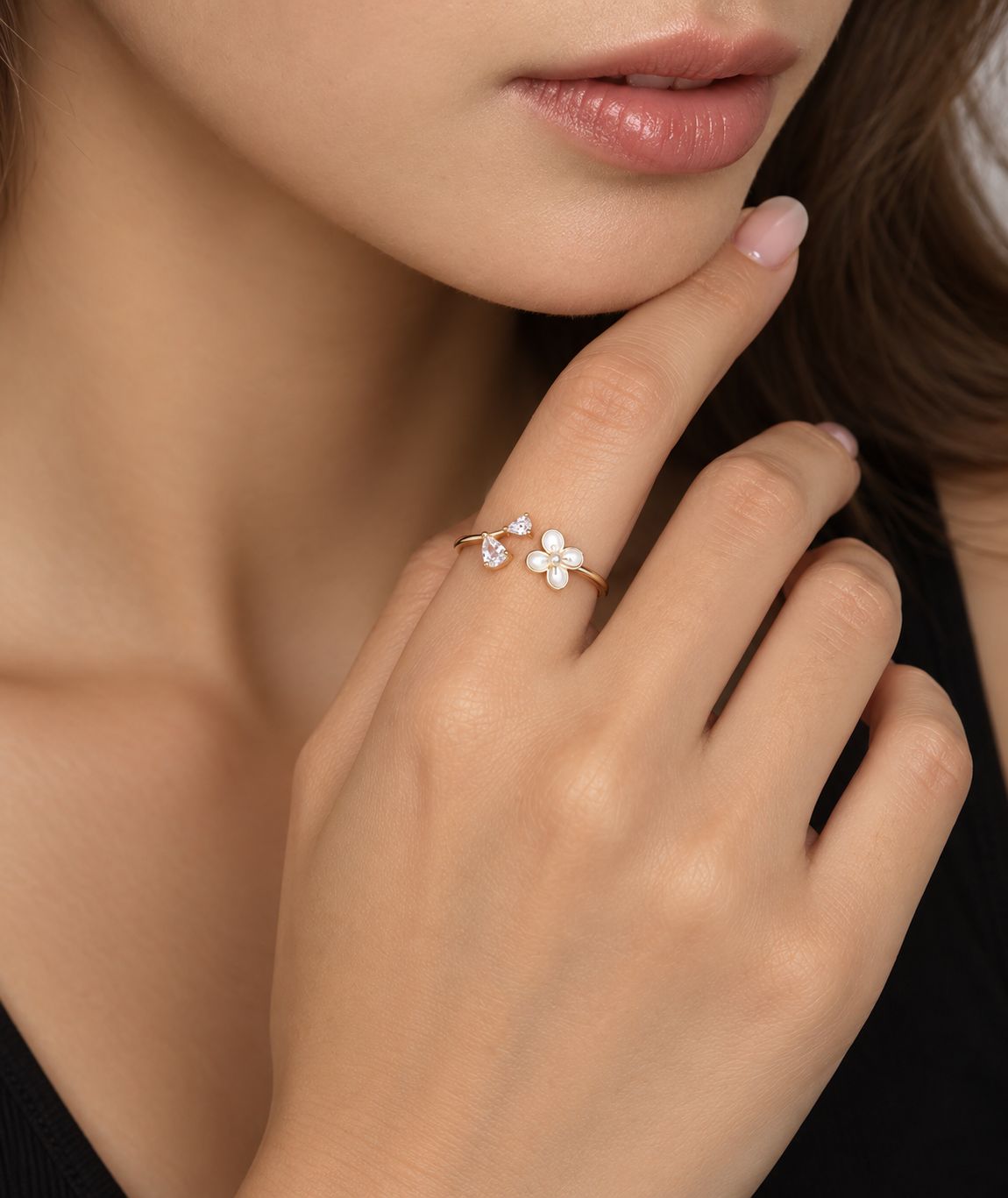 Cleo mother-of-pearl flower CZ open ring, view 3: mother-of-pearl flower with CZ on an open gold-tone band, Dubai