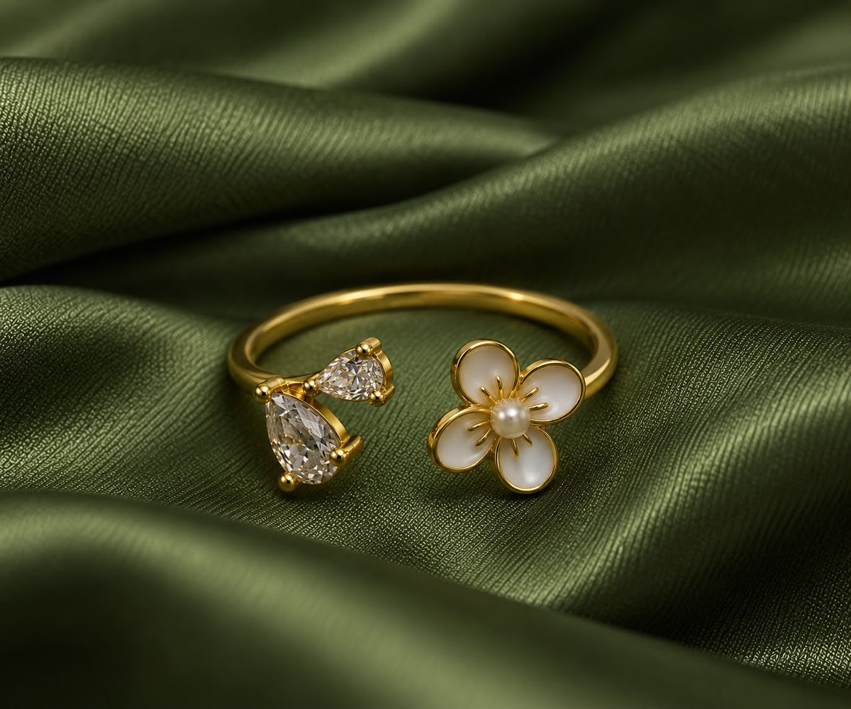 Cleo mother-of-pearl flower CZ open ring, view 6: mother-of-pearl flower with CZ on an open gold-tone band, Dubai