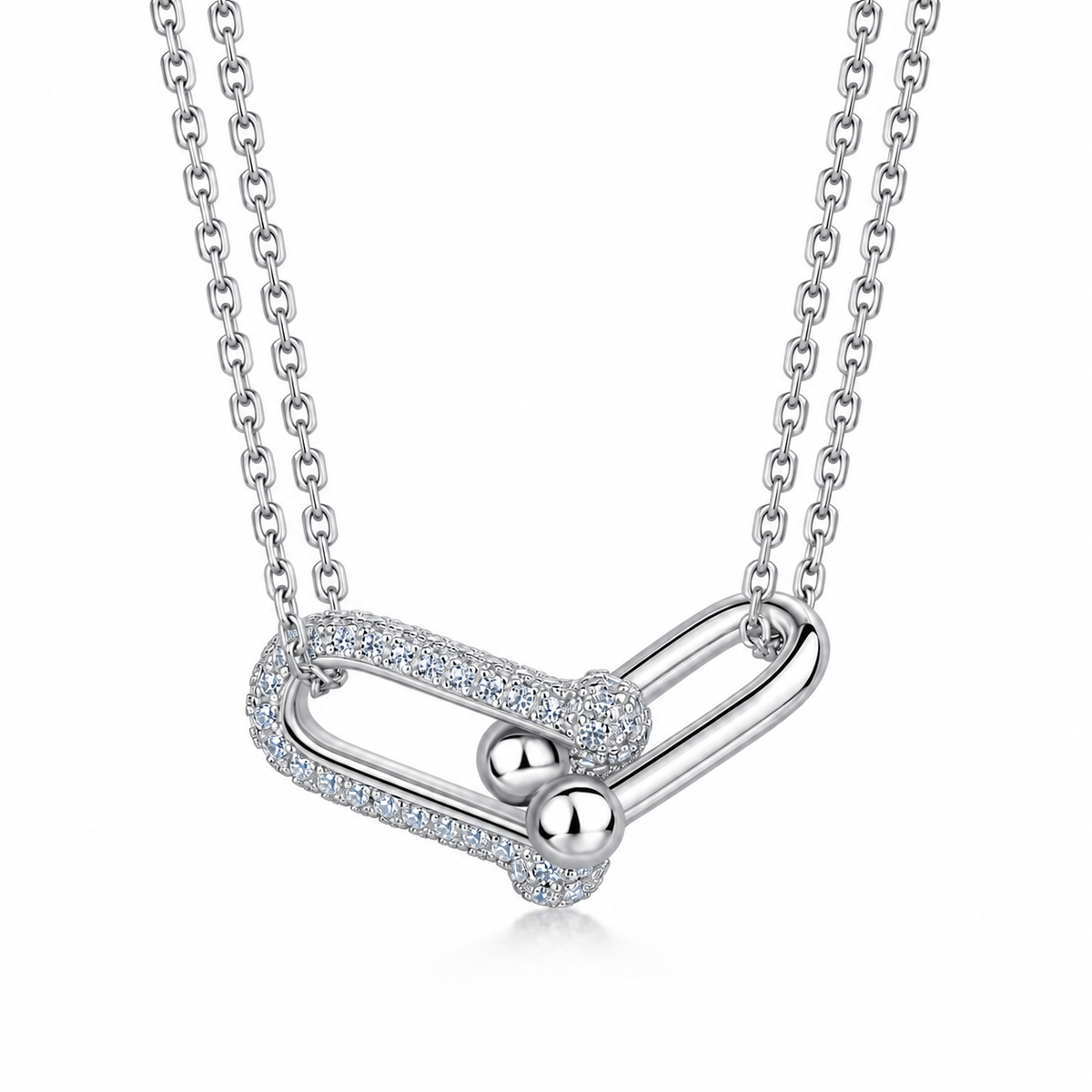 Élan twin-link moissanite necklace close-up: polished link joined to a pavé moissanite link on a double chain, Dubai
