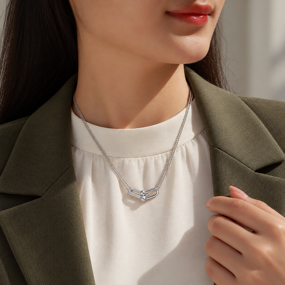 Élan twin-link moissanite necklace, view 3: polished link joined to a pavé moissanite link on a double chain, Dubai