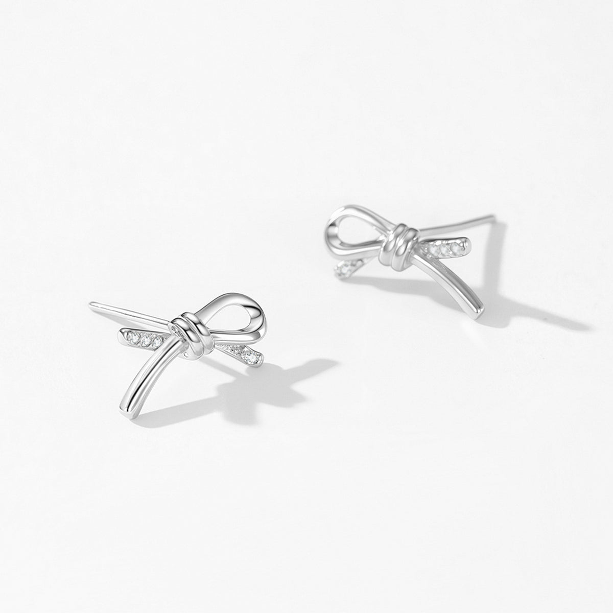 Elina bow CZ necklace & stud earrings set, view 5: sculpted bow pendant with matching bow studs, 925 sterling silver, Dubai
