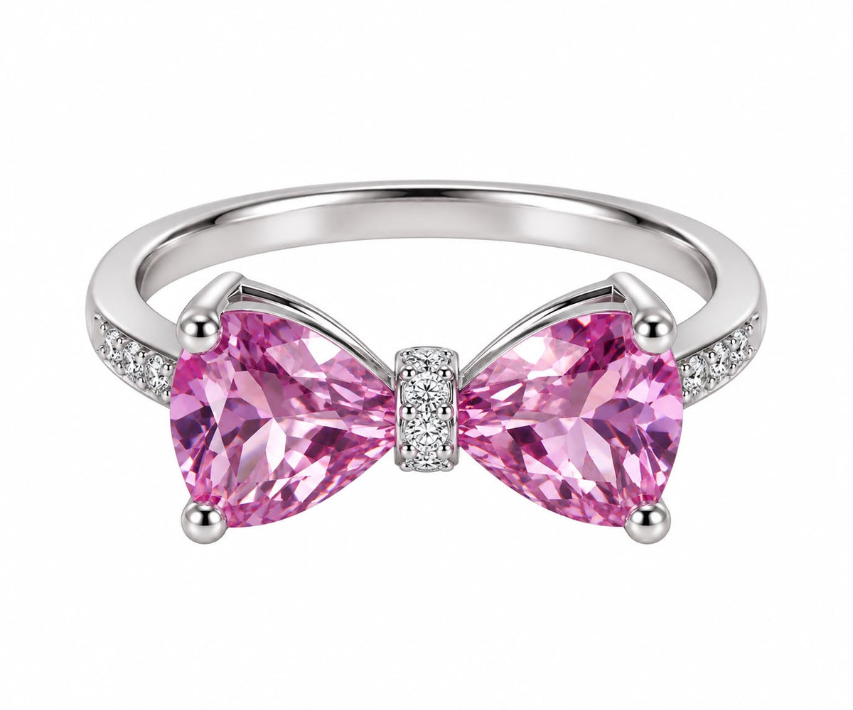 Elodie pink CZ bow ring close-up: playful bow of pink CZ with clear accents, 925 sterling silver, Dubai