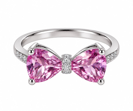 Elodie pink CZ bow ring close-up: playful bow of pink CZ with clear accents, 925 sterling silver, Dubai
