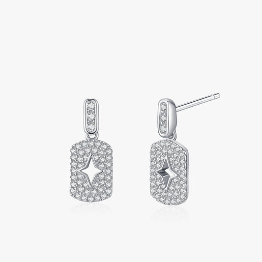 Étoile starlight cutout pavé drop earrings close-up: open star in a rounded rectangular pavé drop, Dubai
