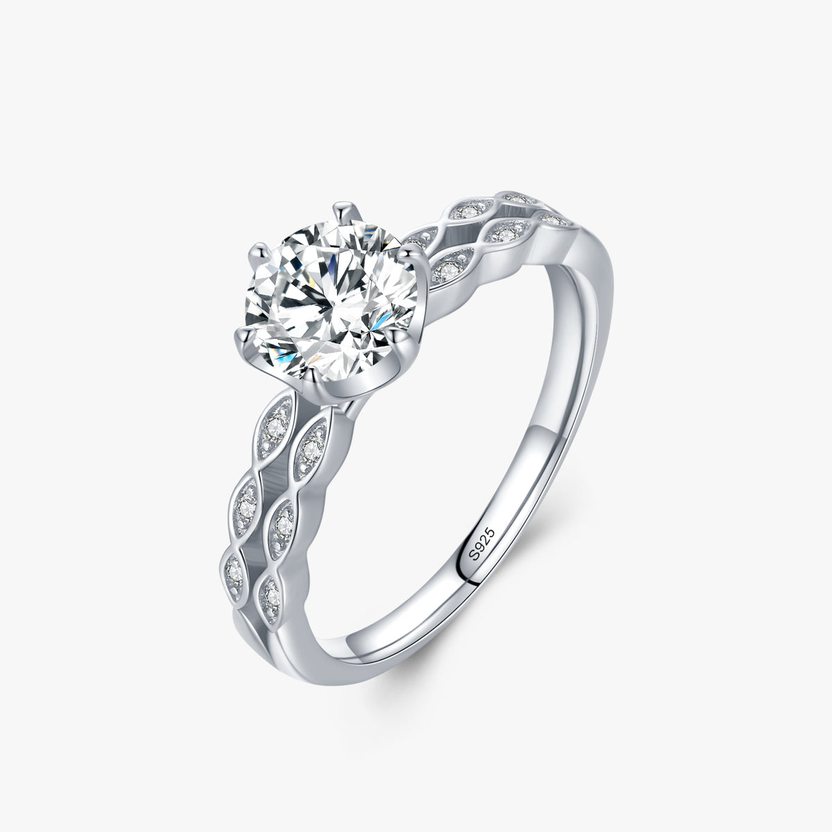 Flora leaf solitaire CZ ring close-up: round CZ in six prongs with leaf-patterned shoulders, 925 sterling silver, Dubai