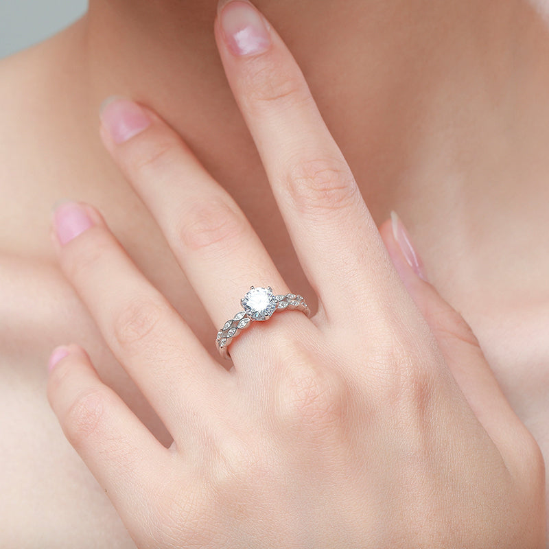 Flora leaf solitaire CZ ring, view 3: round CZ in six prongs with leaf-patterned shoulders, 925 sterling silver, Dubai