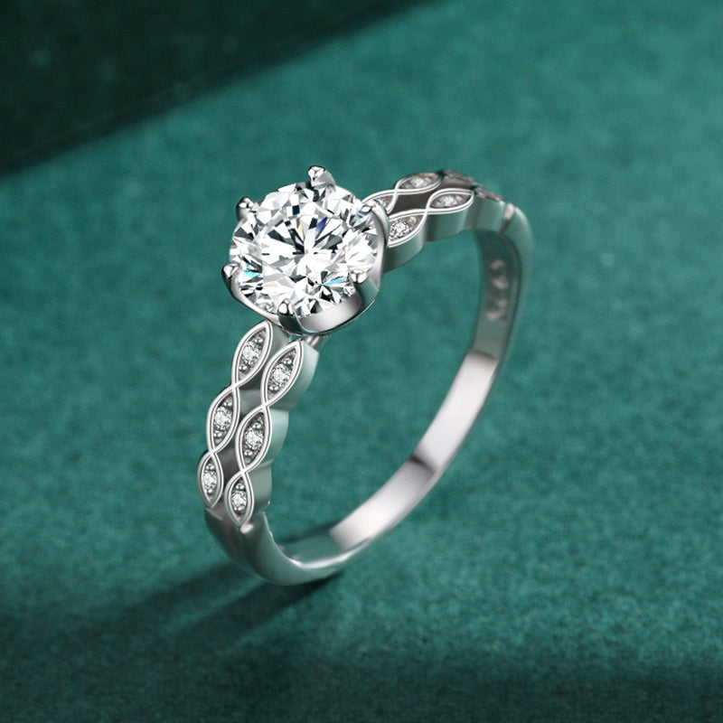 Flora leaf solitaire CZ ring, view 4: round CZ in six prongs with leaf-patterned shoulders, 925 sterling silver, Dubai