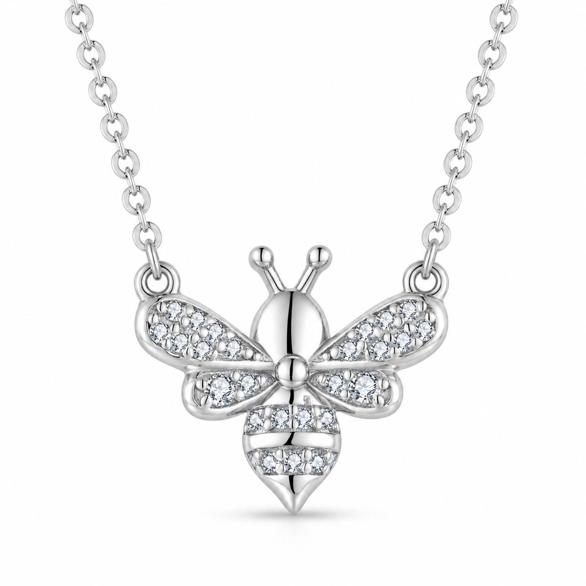 Honeylight pavé bee moissanite necklace close-up: petite bee pendant with pavé wings and stone-set body, Dubai