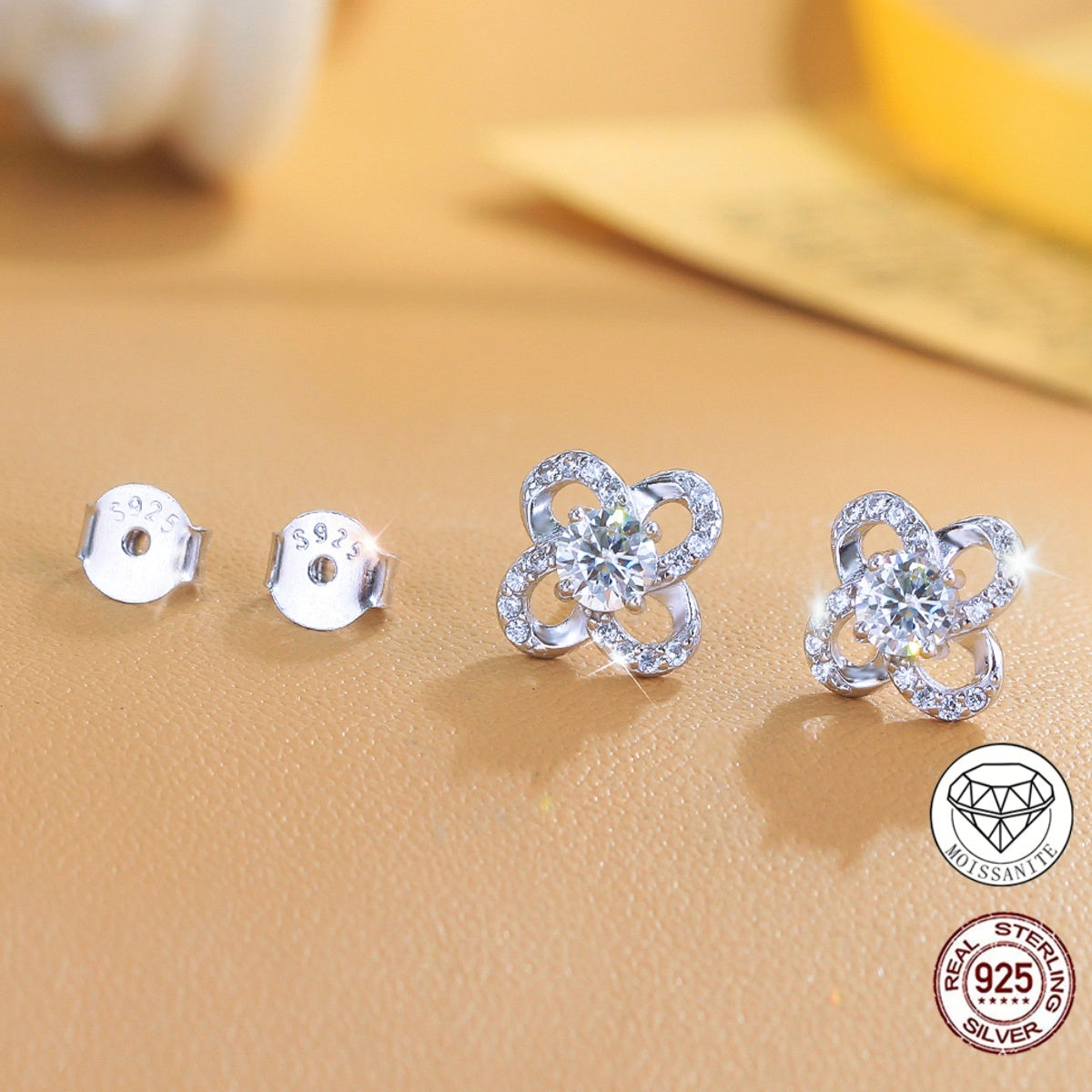 Jana four-loop flower moissanite stud earrings, view 3: 4 mm moissanite studs in a four-loop flower frame, Dubai