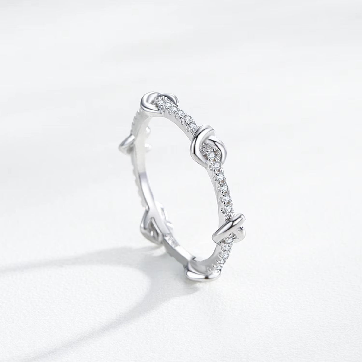 Mila heart knot CZ ring, view 6: small polished hearts along a CZ-set band, 925 sterling silver, Dubai