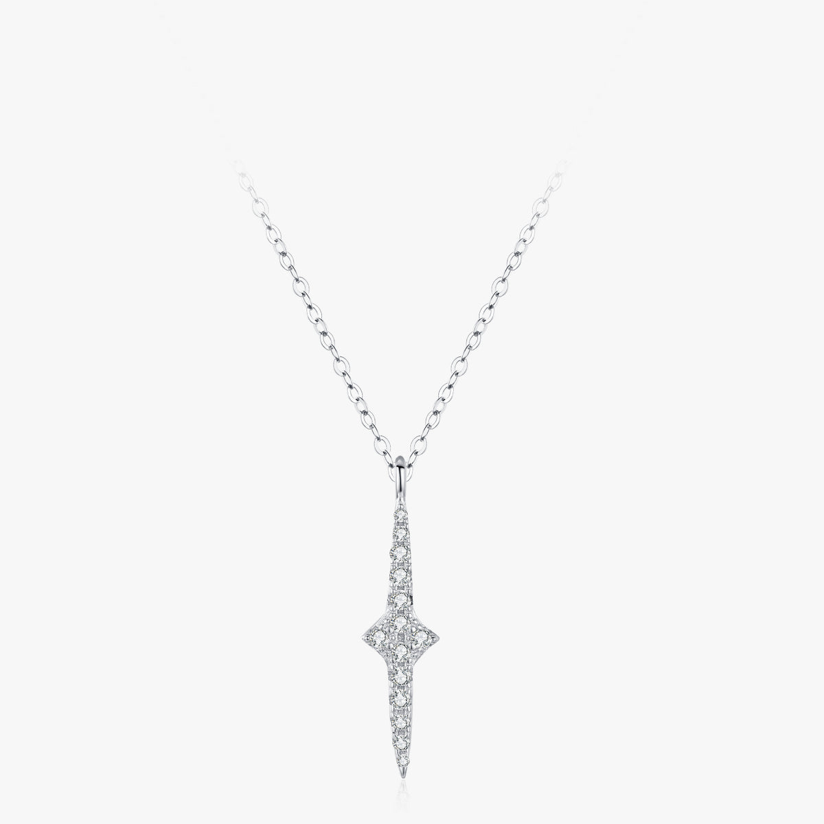 Nova star-point pendant necklace close-up: long geometric star-point pendant with clear stones, 925 sterling silver, Dubai