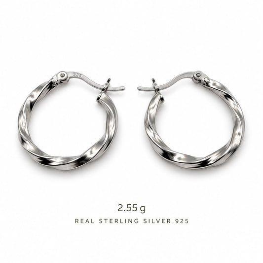 Pia twisted hoop earrings close-up: twisted polished hoops, 925 sterling silver, Dubai