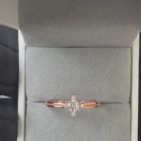 Video of the Rosette Radiance five-stone moissanite ring sparkling