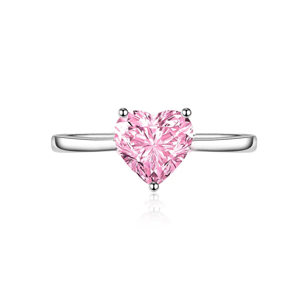 Rosalie pink heart-cut CZ ring close-up: pink heart-cut CZ in three prongs on a slim band, 925 sterling silver, Dubai