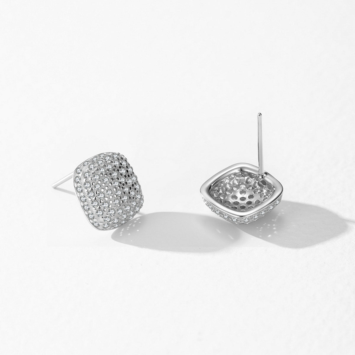 Solenne cushion pavé CZ stud earrings, view 5: domed cushion-square studs covered in tiny CZ, 925 sterling silver, Dubai