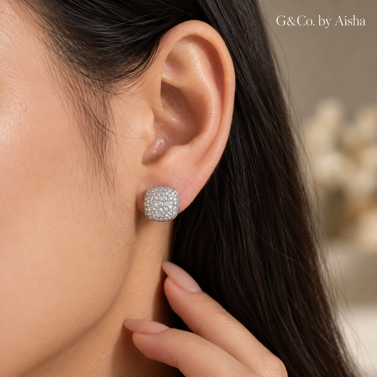 Solenne cushion pavé CZ stud earrings, view 3: domed cushion-square studs covered in tiny CZ, 925 sterling silver, Dubai