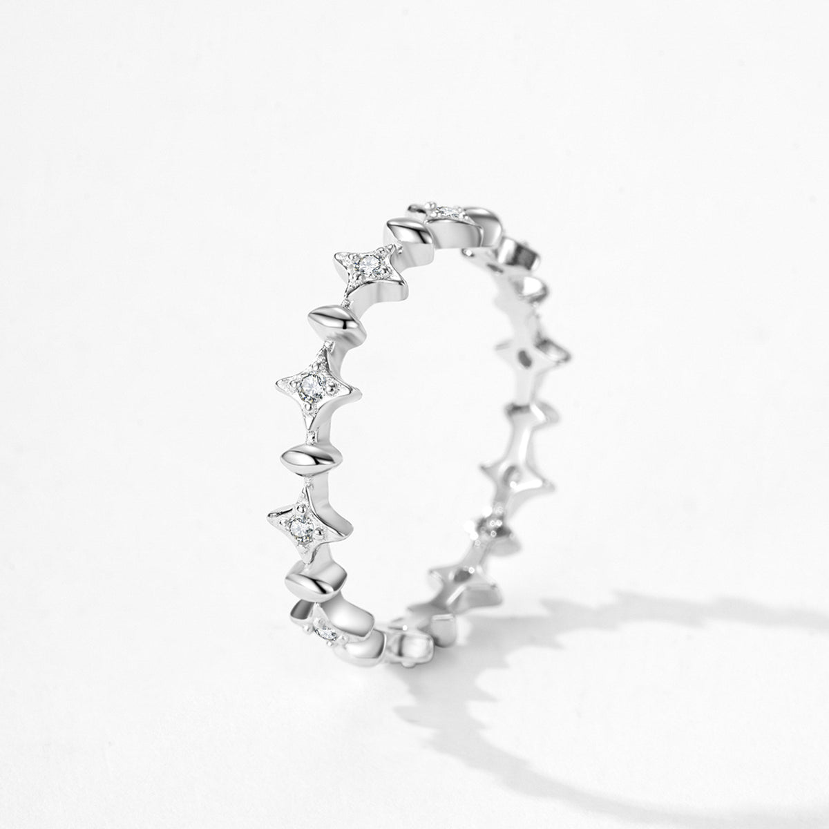 Stella starlit cross CZ band ring close-up: full band of star-cross details set with CZ, 925 sterling silver, Dubai