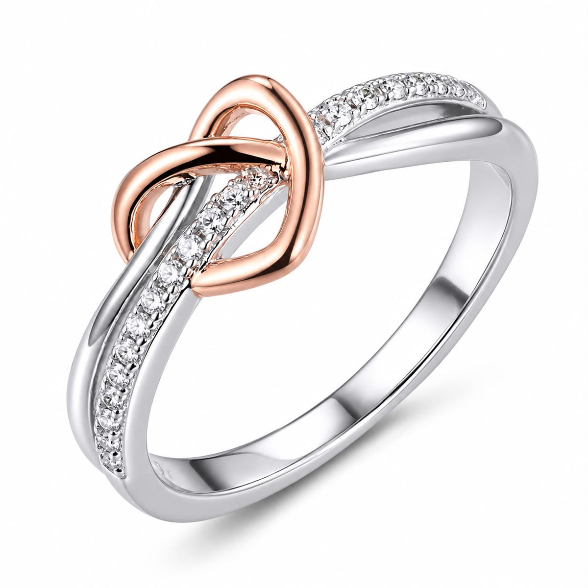 Yasmin two-tone intertwined heart CZ ring close-up: intertwined bands with a rose-gold-plated heart and CZ, Dubai